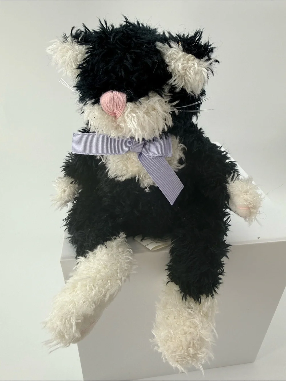 Plush Black & White Cat Toy with Lavender Bow - Soft Cuddly Pet Playmate